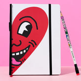 Blackwing Volume 292 Keith Haring Notebook with "Smiling Heart" Illlustration. Comes with a Keith Haring "Dancing Figures" pencil